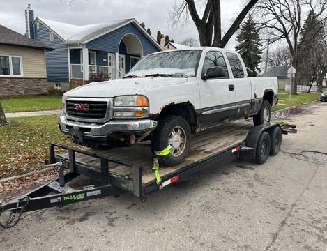 GetMyScrap | GMC Truck on Trailer for Junk Car Removal and Scrap Metal Recycling