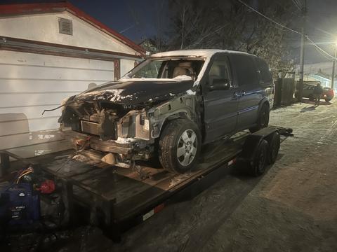 GetMyScrap | Junk Car Removal of a Damaged Minivan for Scrap Metal Recycling