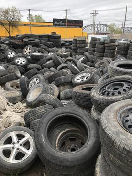 GetMyScrap | Pile of Scrap Tires and Rims Ready for Recycling