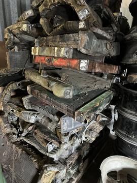 Stacked Scrap Metal Radiators at Recycling Facility