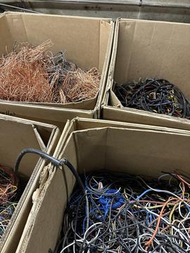 Scrap Metal Recycling: Organized Bins of Copper and Electrical Wires